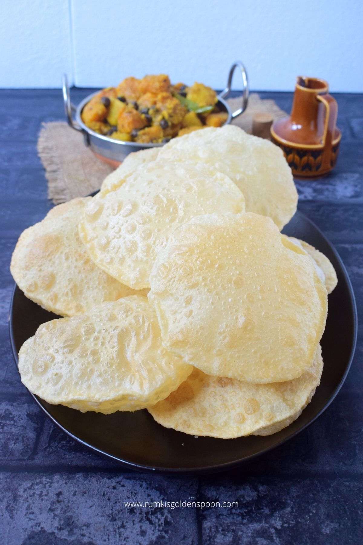 luchi, luchi recipe, luchi aloo dum, recipe for luchi, luchi cholar dal, recipe for bengali luchi, bengali luchi recipe, recipe of bengali luchi, how to make luchi, luchi recipe bengali style, bengali luchi aloo dum recipe, recipe for bengali luchi and aloo dum, how to prepare luchi, Bengali style deep fried puffed bread, deep fried mini breads, puffed Bengali luchai bread, luchai puri recipe, loochi, loochi recipe, durga puja recipe, durga puja food, bengali traditional food, traditional food of Bengali, traditional bengali food, bengali food recipes, recipes of bengali food, homemade bengali food, niramish recipe, bengali veg recipe, Bengali recipe, Bengali recipes, flat bread recipe, Rumki's Golden Spoon